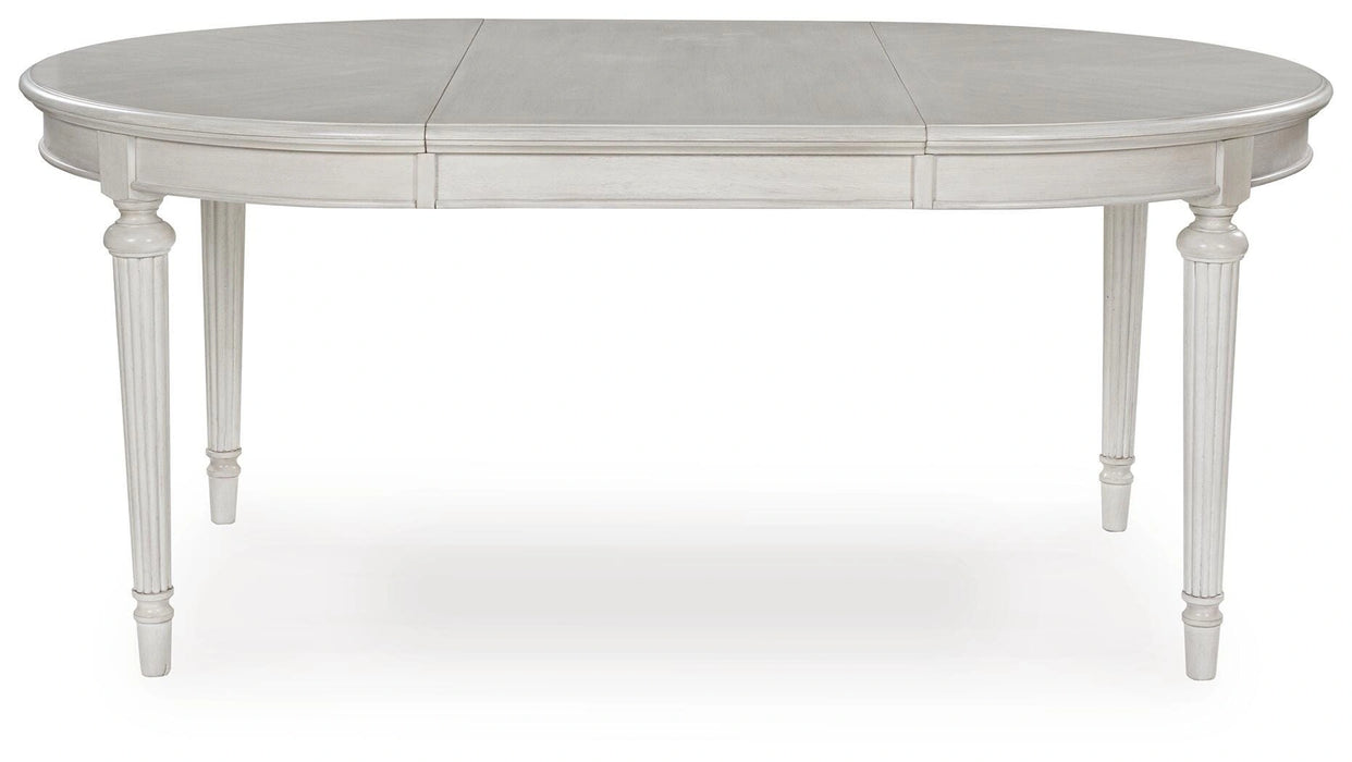Montelaine Dining Extension Table - Dream Home Furniture & Mattress (Waite Park, MN)