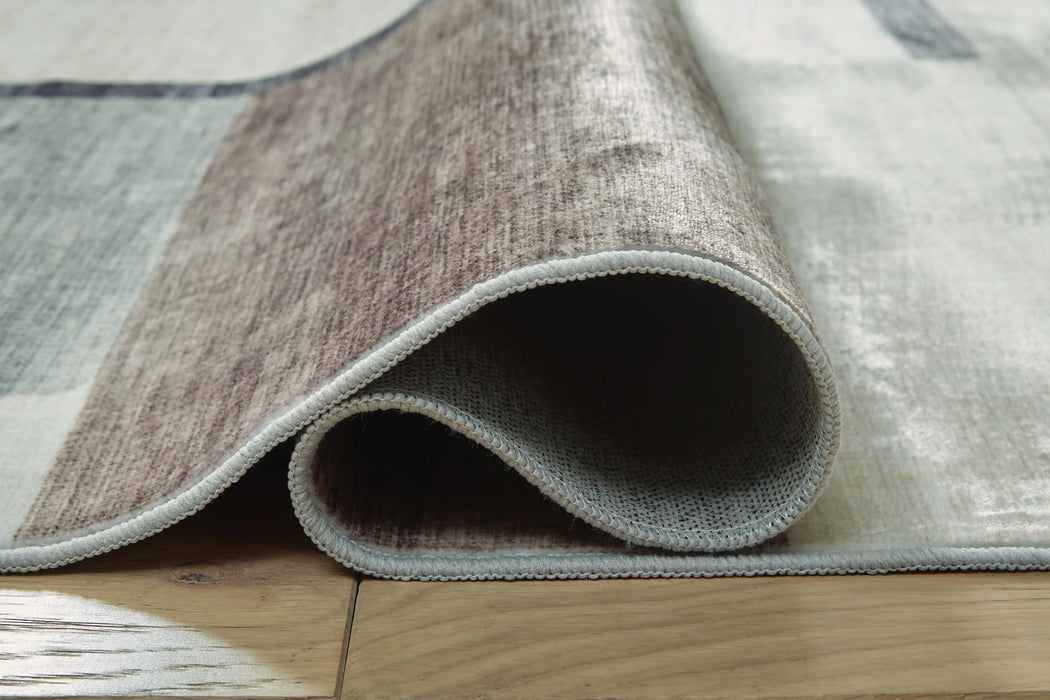 Larkport Washable Area Rug - Dream Home Furniture & Mattress (Waite Park, MN)