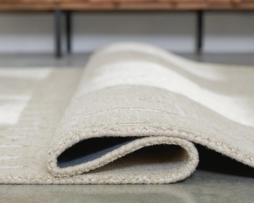 Wolbert 7'8" x 10' Area Rug - Dream Home Furniture & Mattress (Waite Park, MN)