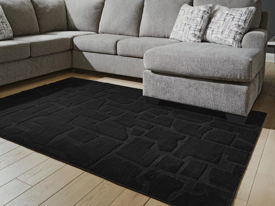 Gibbswell Washable 5' x 7' Area Rug - Dream Home Furniture & Mattress (Waite Park, MN)