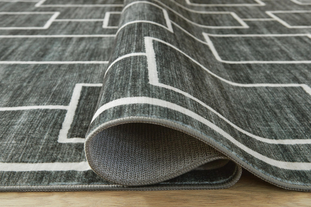 Elderland Washable 7'6" x 9'6" Area Rug - Dream Home Furniture & Mattress (Waite Park, MN)