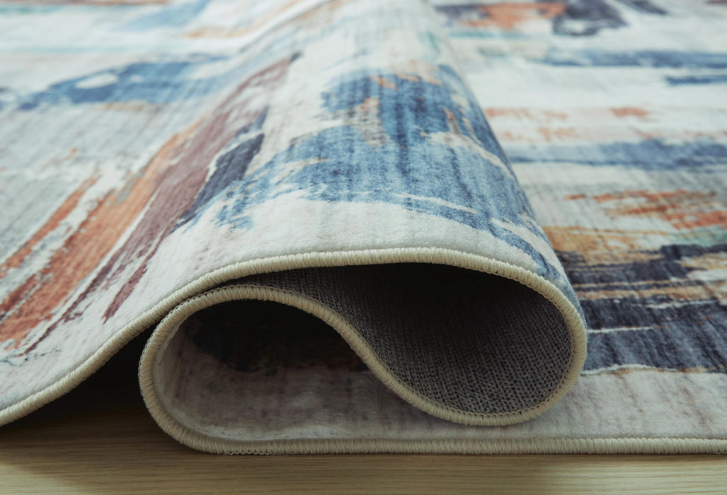 Hessland Rug Large - Dream Home Furniture & Mattress (Waite Park, MN)