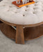GUIS Round Coffee Table, Beige - Dream Home Furniture & Mattress (Waite Park, MN)