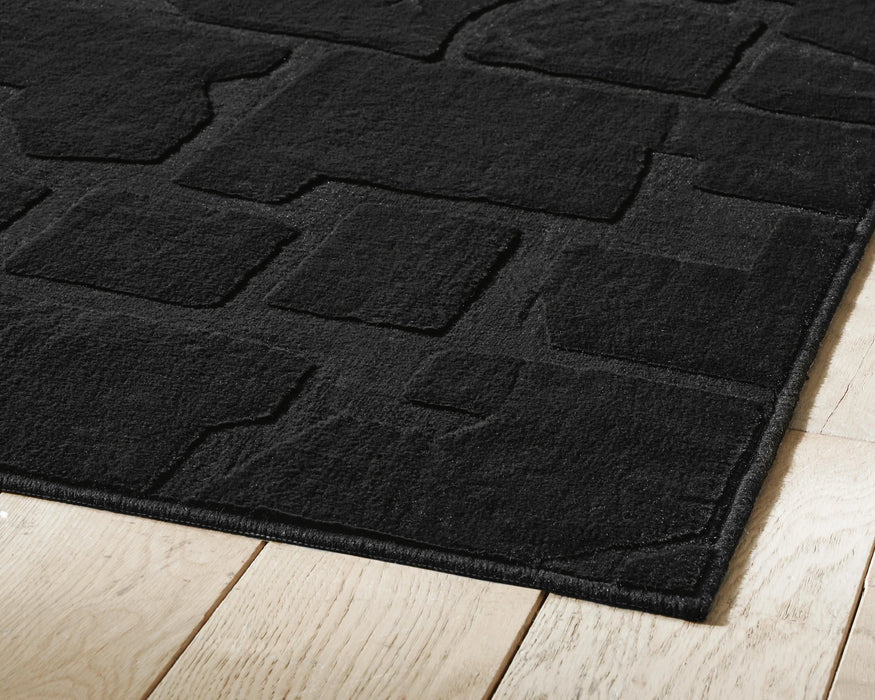 Gibbswell Washable 5' x 7' Area Rug - Dream Home Furniture & Mattress (Waite Park, MN)