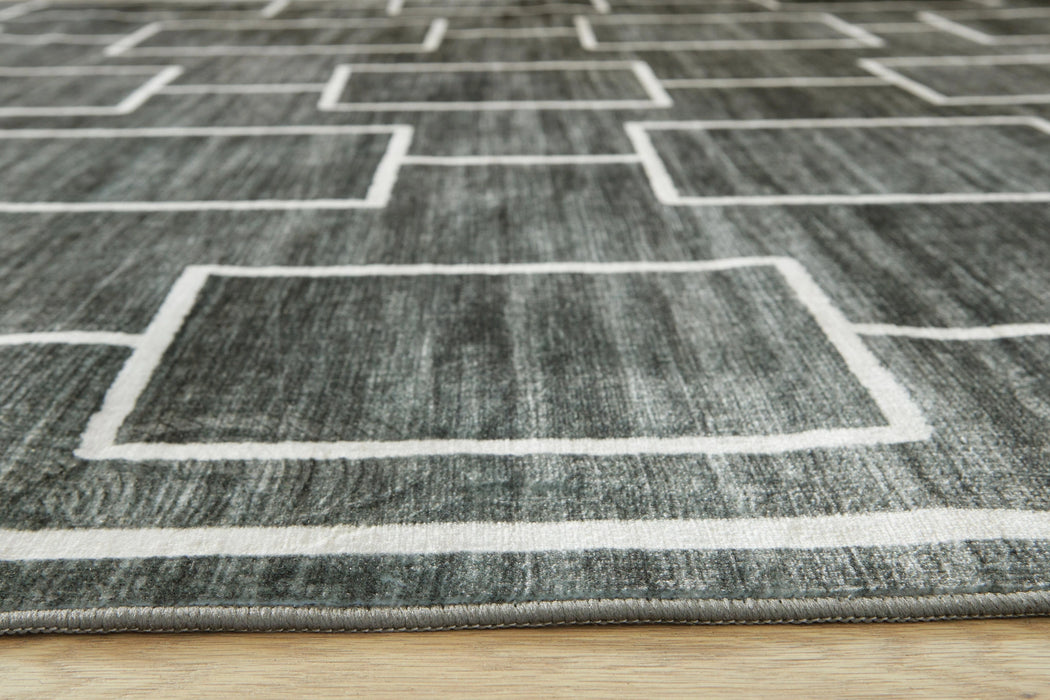 Elderland Washable 7'6" x 9'6" Area Rug - Dream Home Furniture & Mattress (Waite Park, MN)